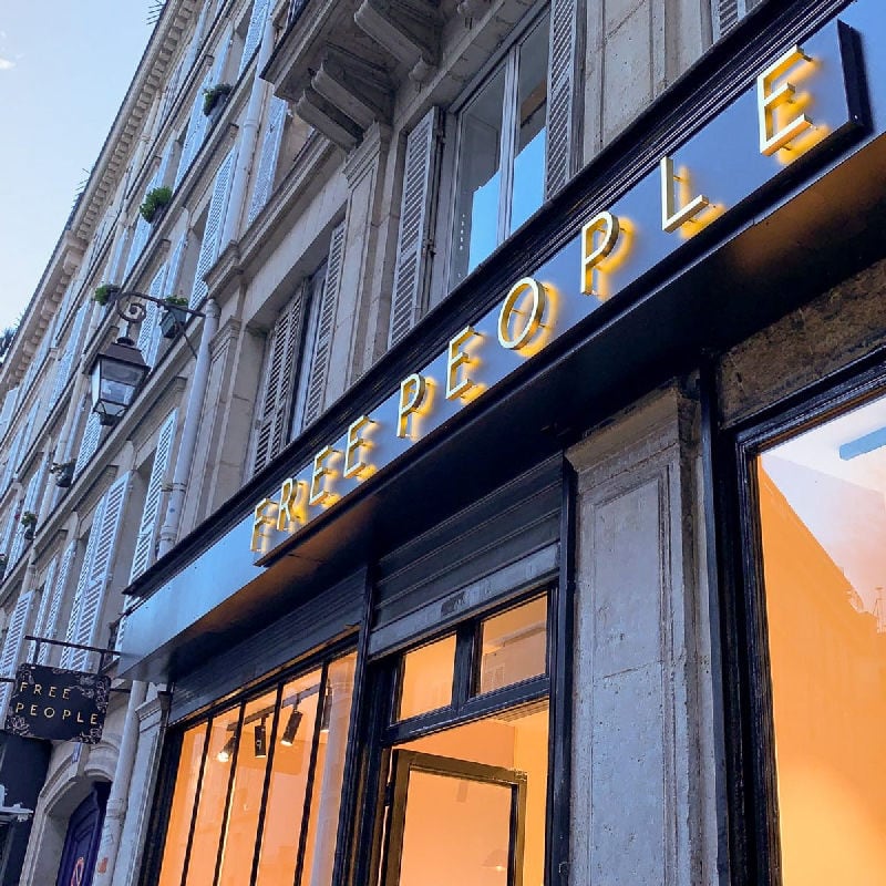 Illuminated sign free people Paris storefront