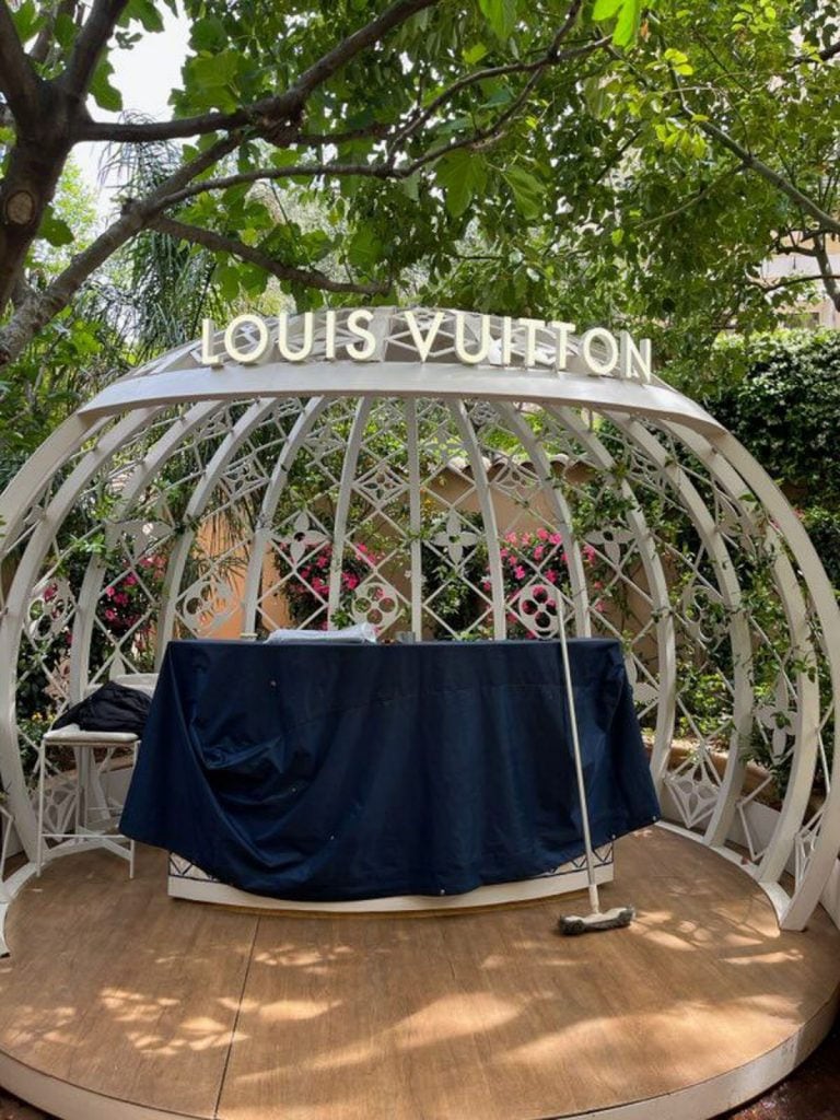 Illuminated sign Louis Vuitton structure decoration