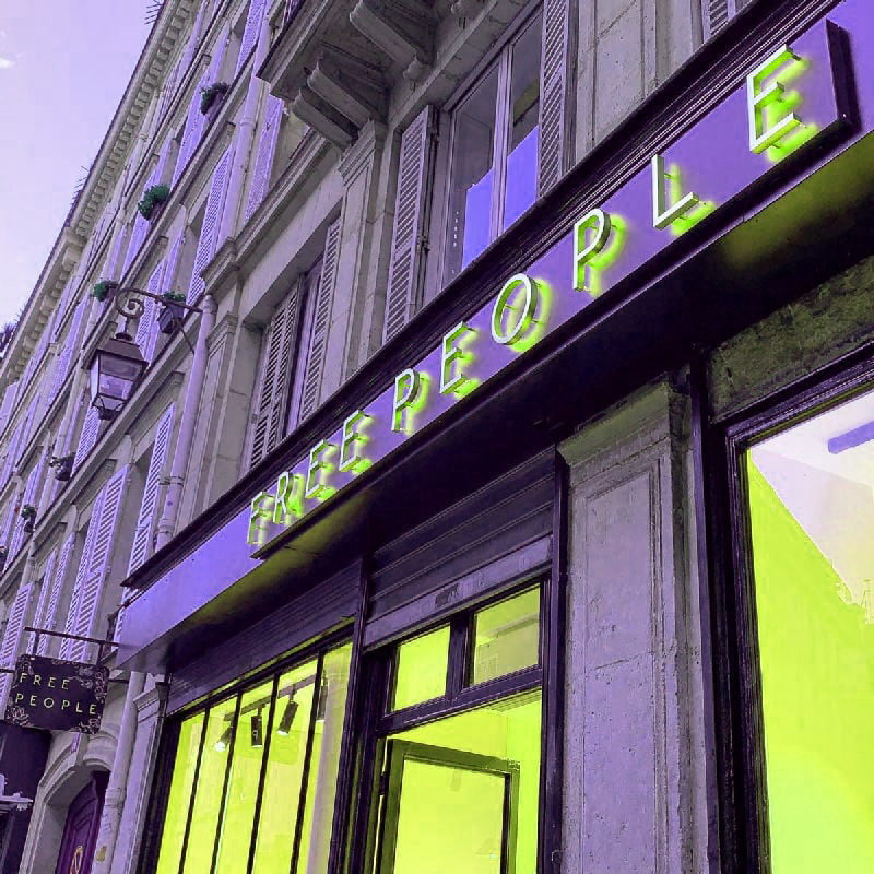 Illuminated sign free people paris storefront